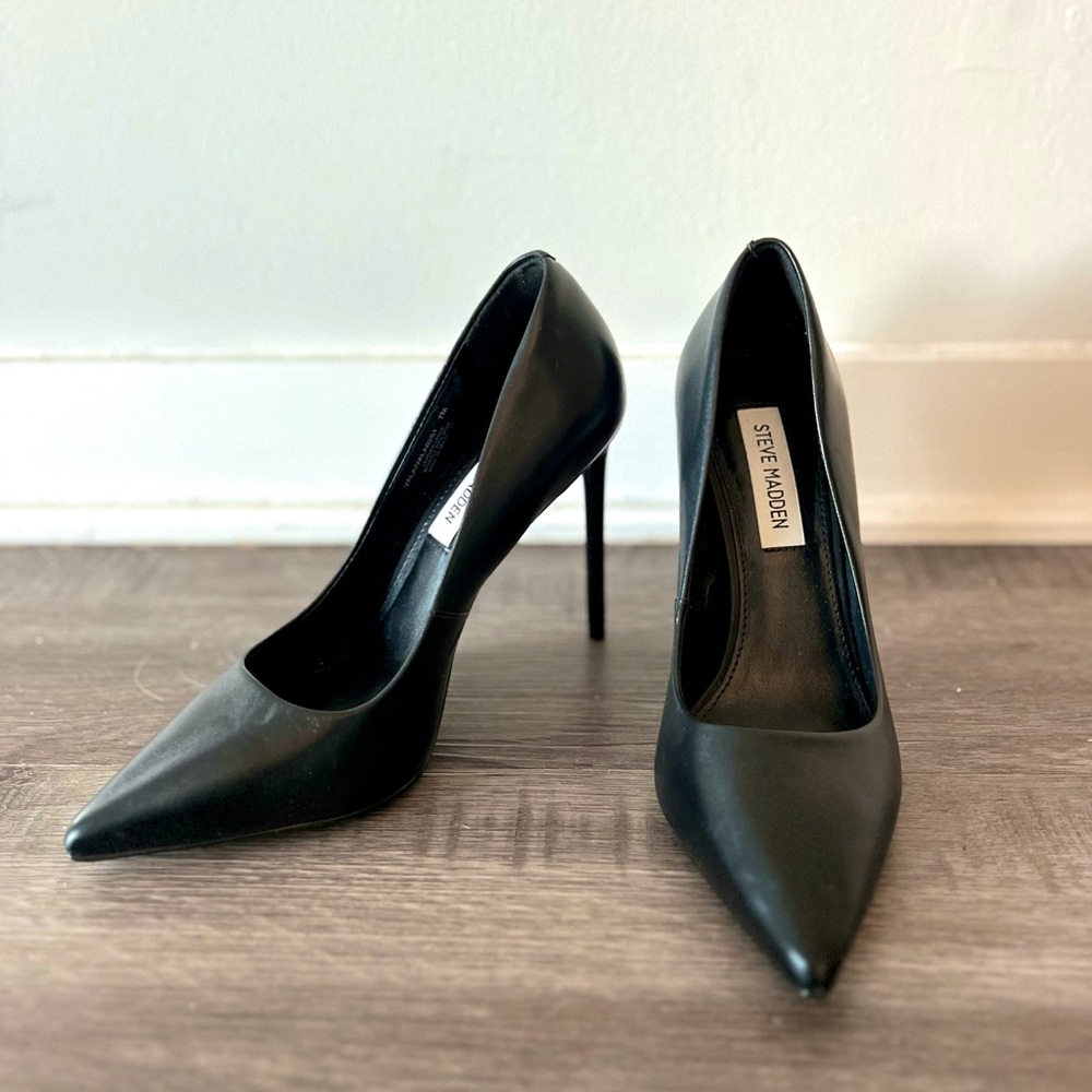 Brand new, never worn black heels.